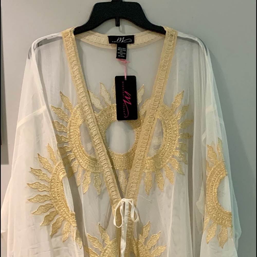 This is a duster 41”L, gold and sheer.